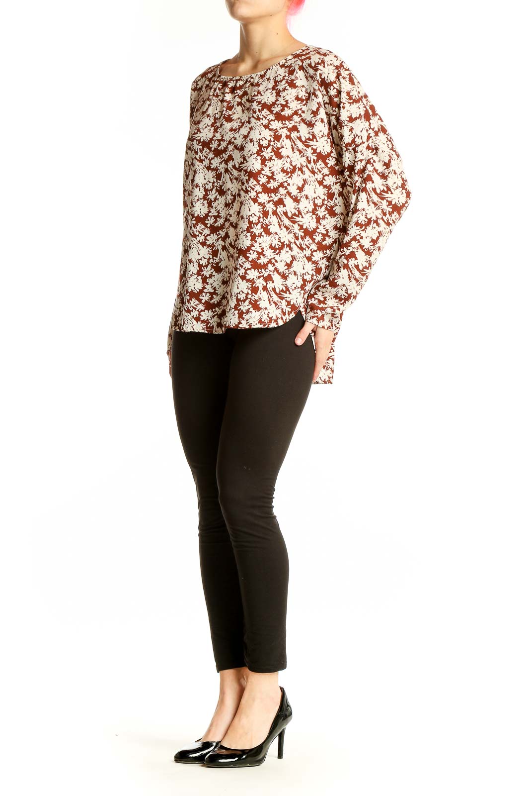 Front view of Carly Jeans brown floral long sleeve blouse on model