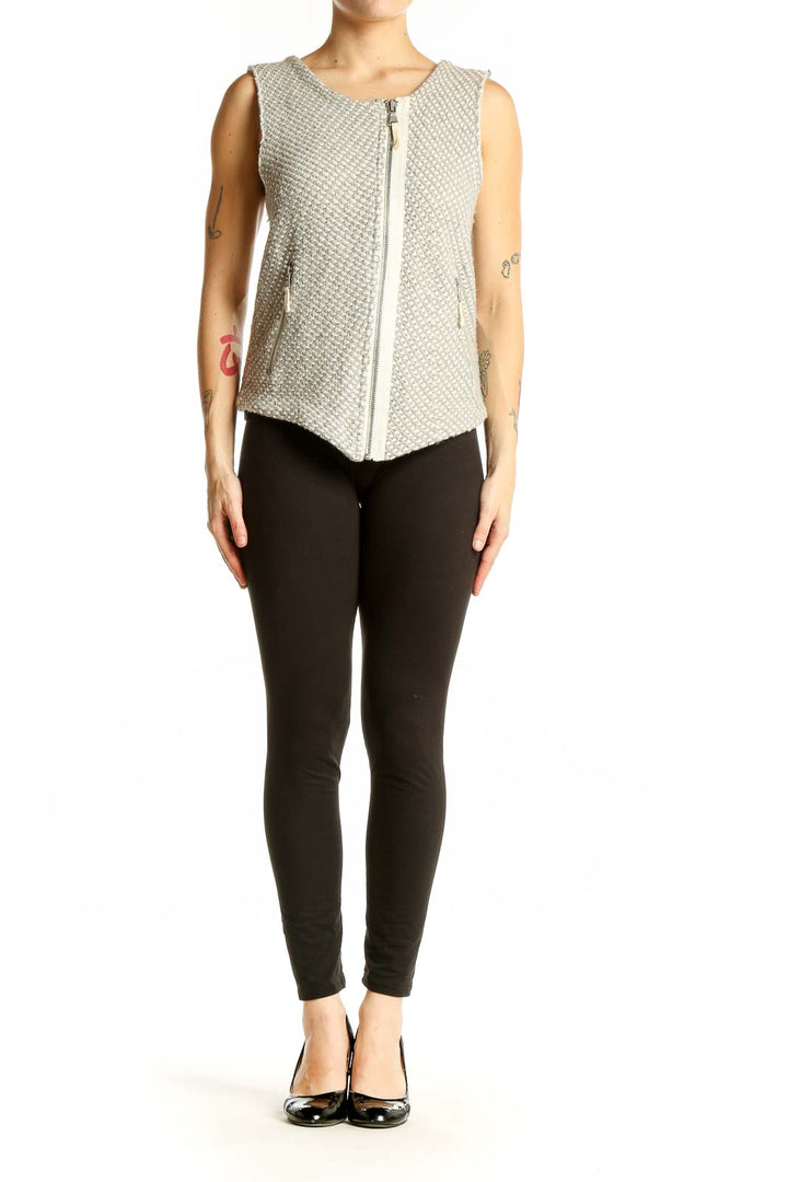 Front view of gray textured sleeveless vest with zipper closure