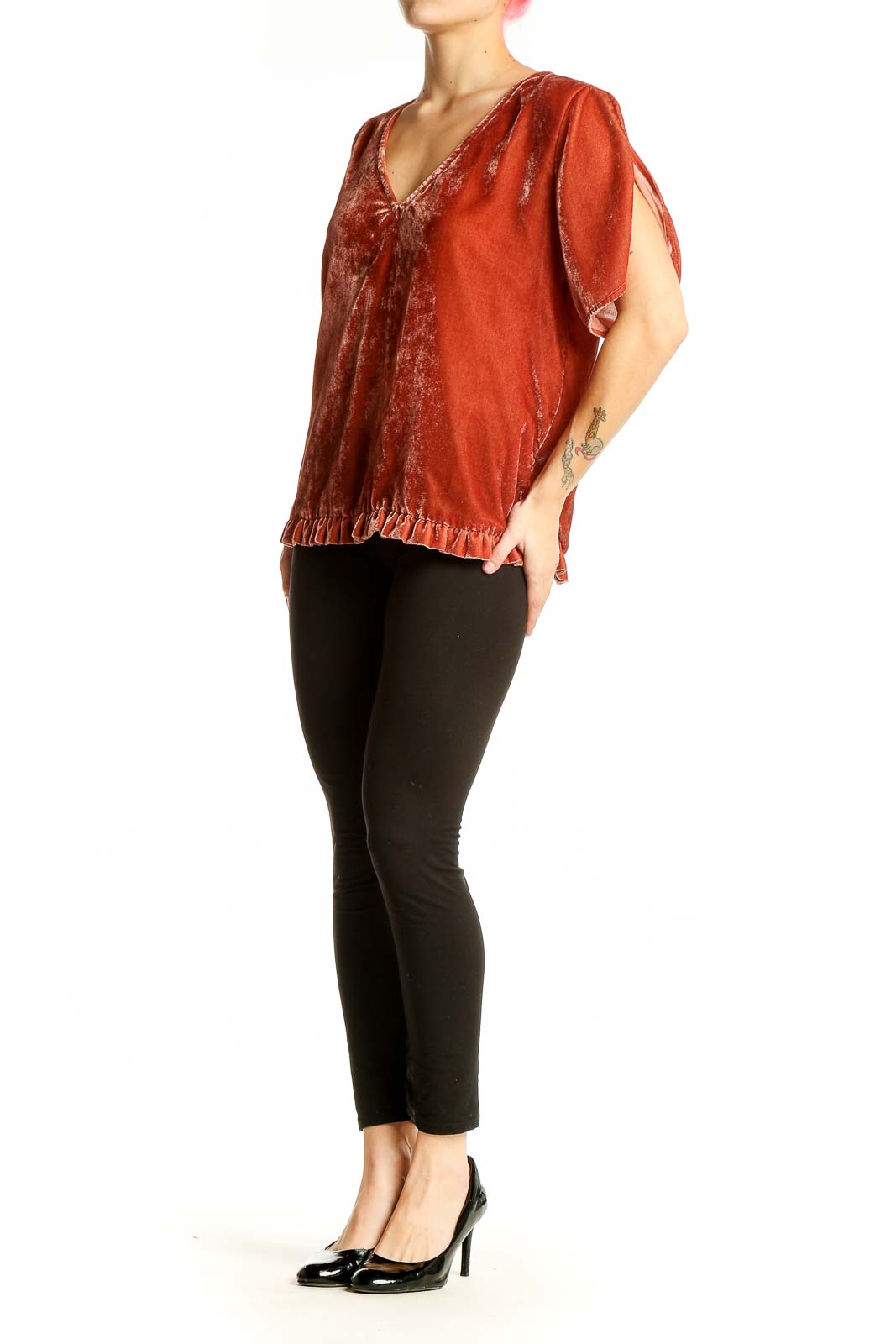 Front view of Madewell rust velvet V-neck blouse with ruffle hem