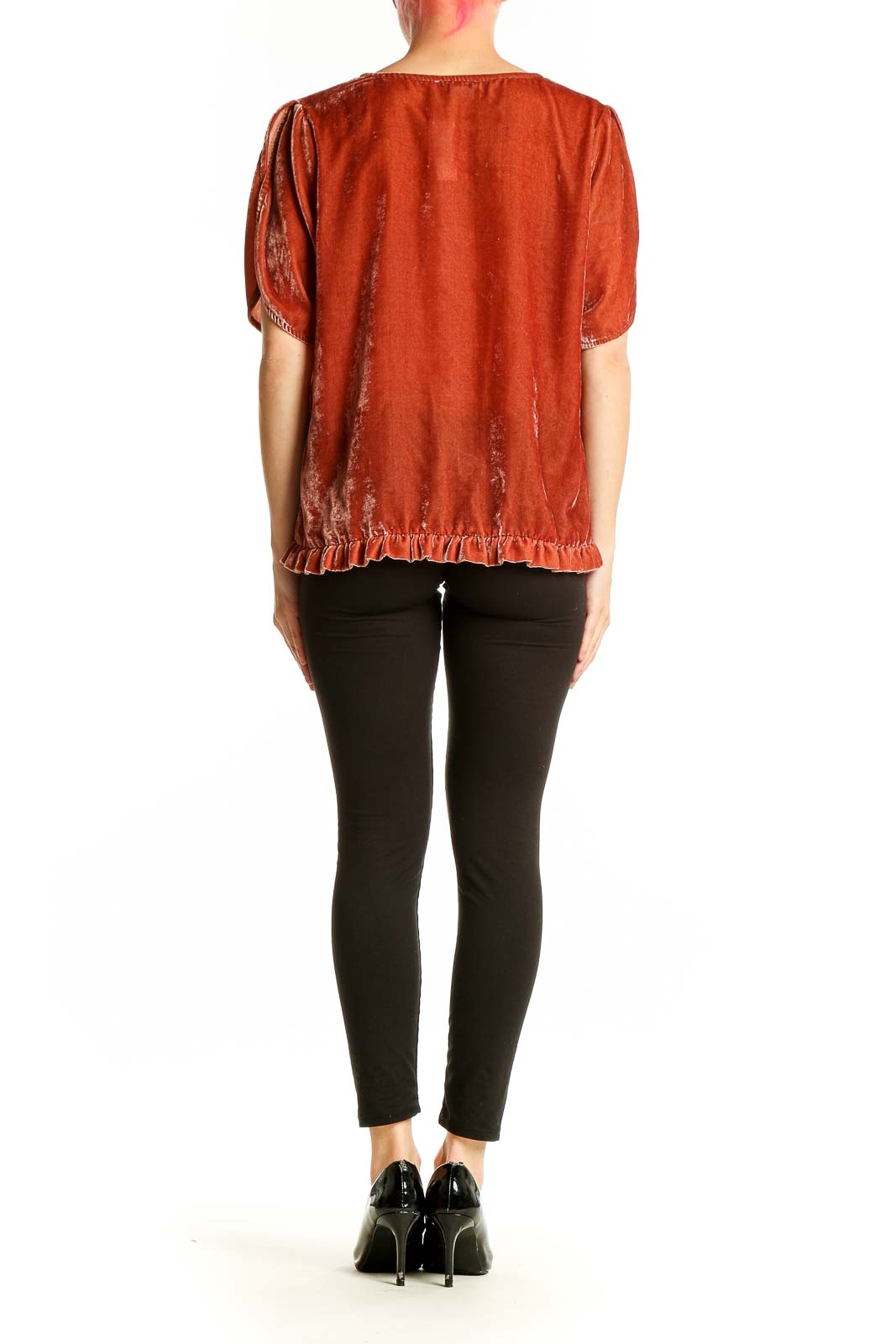 Side view of Madewell rust velvet blouse showing drape and fit