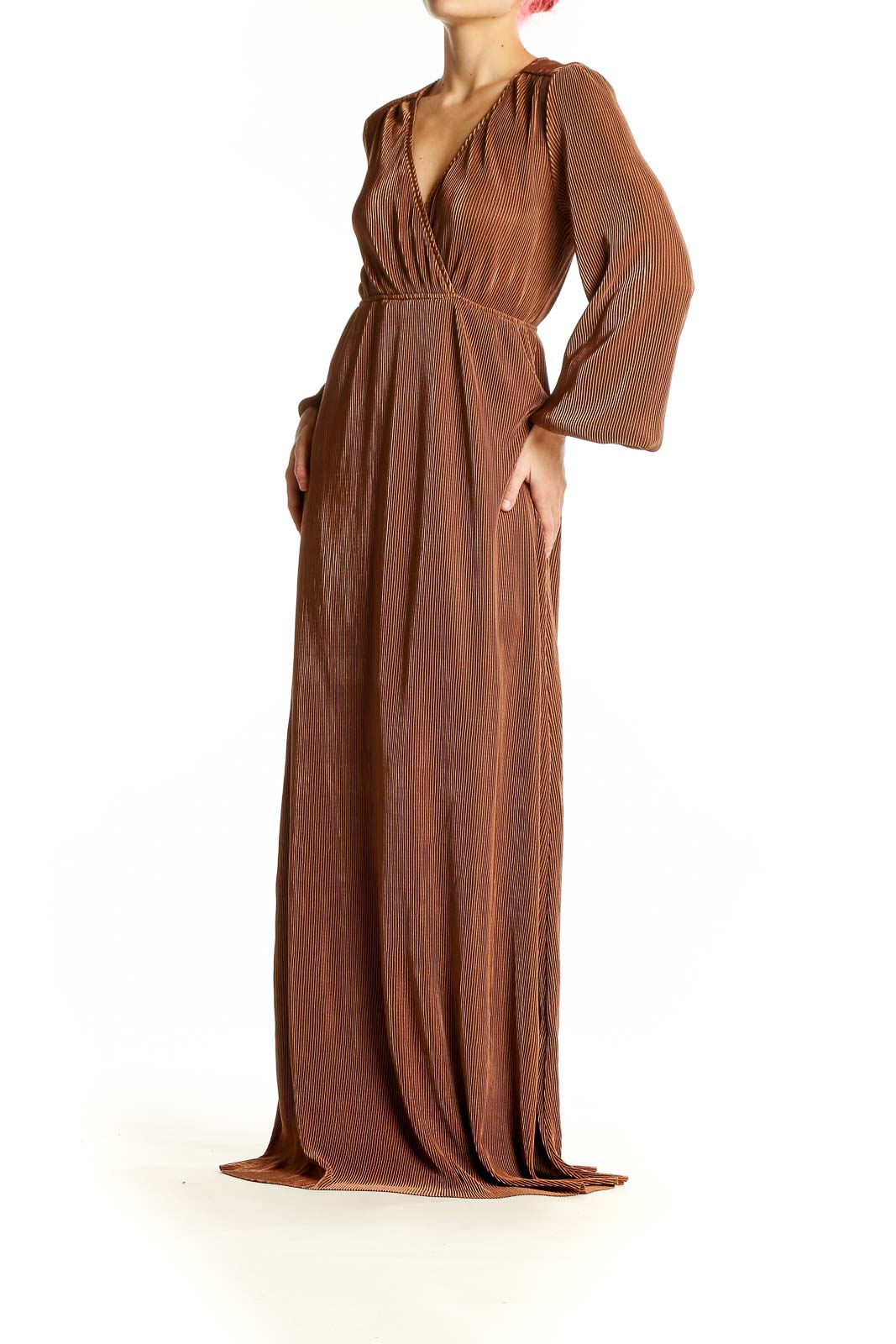Front view of Baltic Born copper pleated wrap maxi dress with long sleeves
