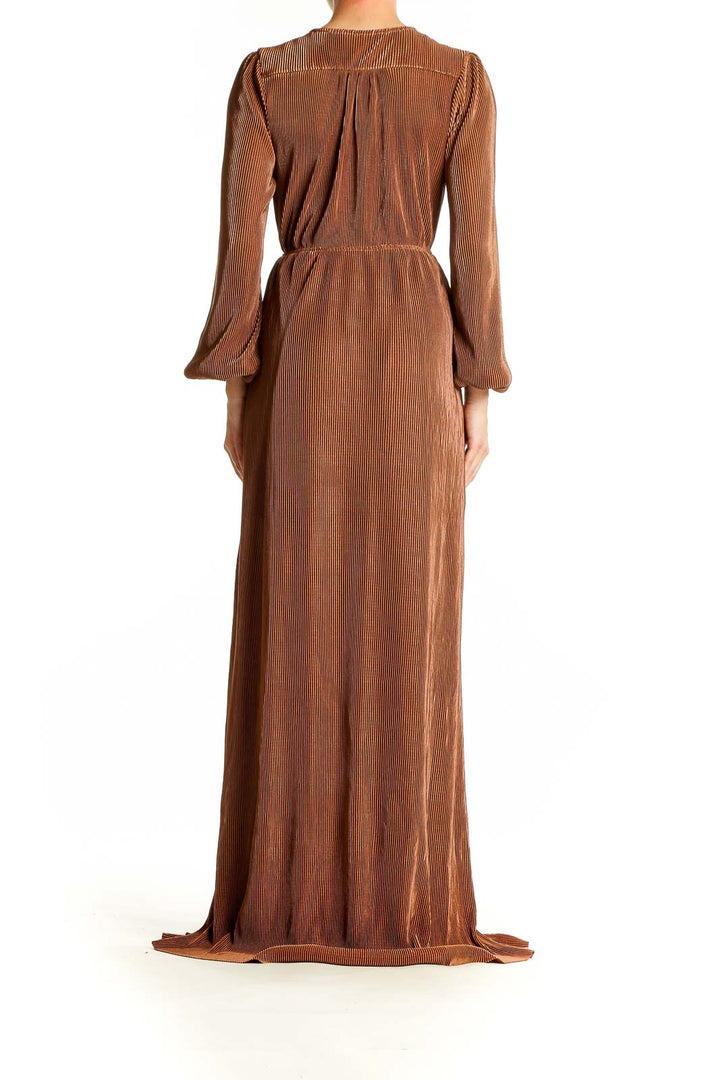 Back view of Baltic Born copper pleated wrap maxi dress showing full-length silhouette