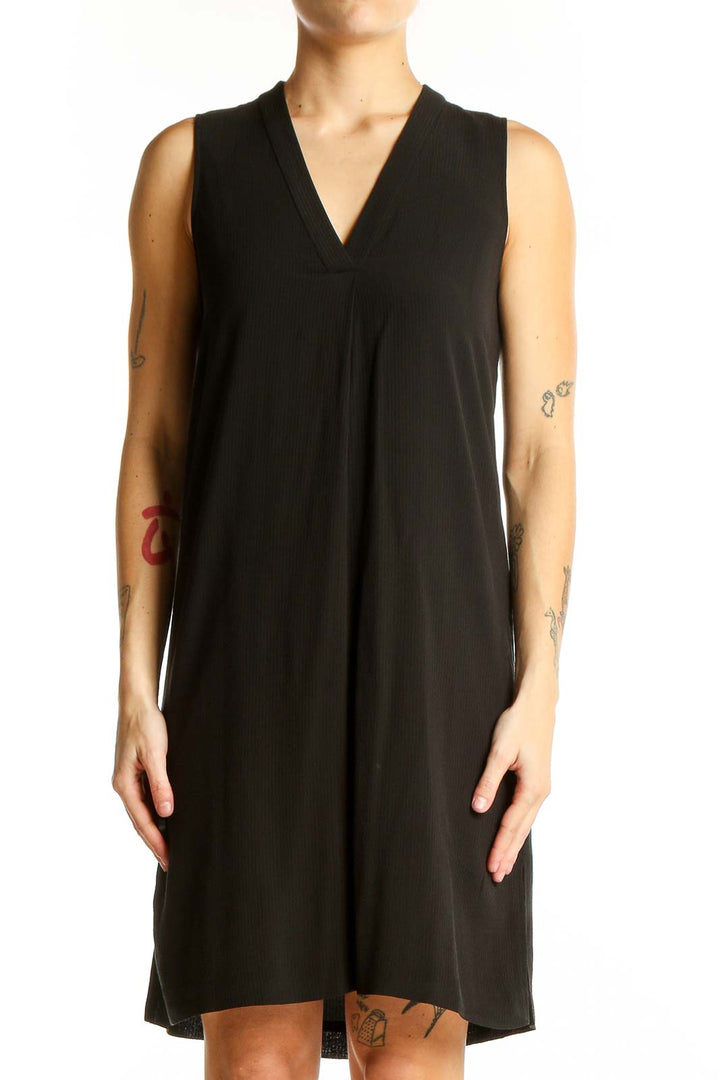 Front view of black sleeveless V-neck shift dress by Theory