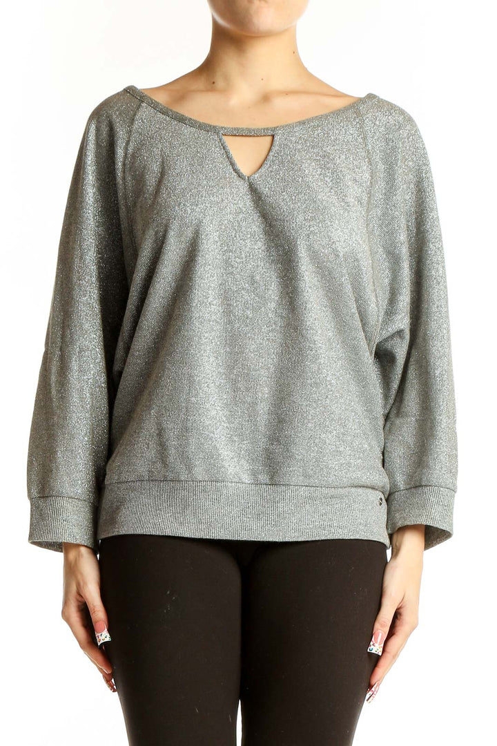 Front view of Guess silver metallic sweatshirt with keyhole neckline