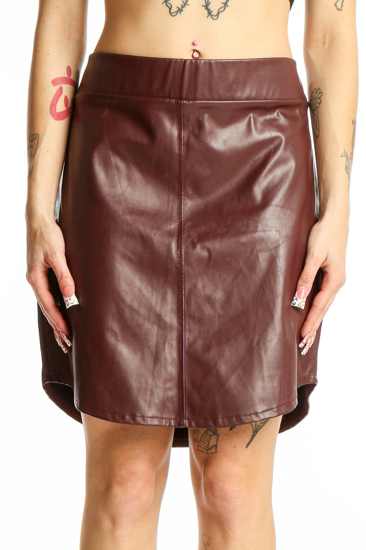 Front view of burgundy faux leather mini skirt from ASOS