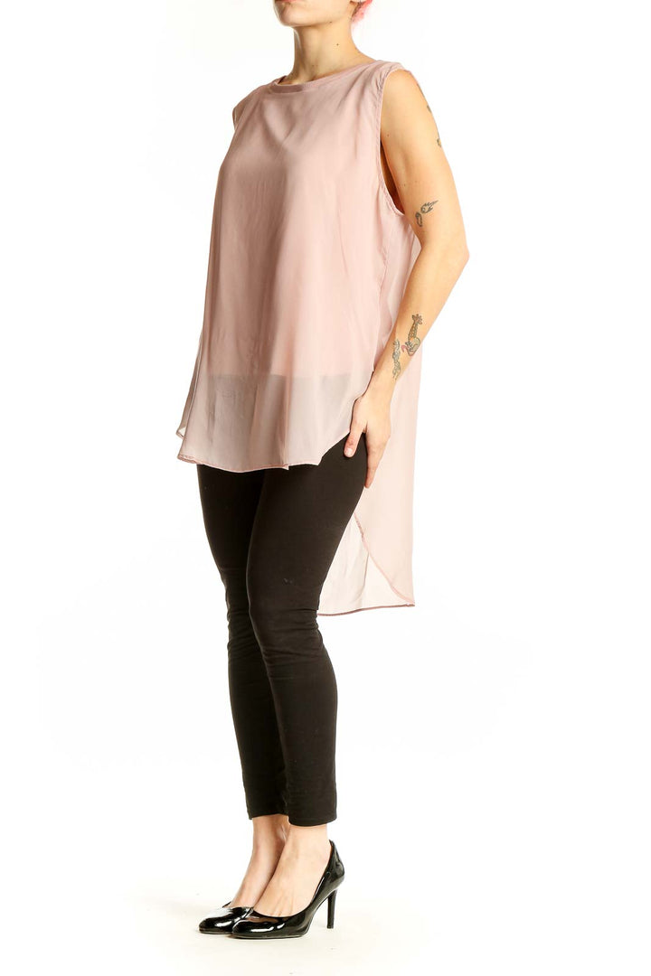 Front view of blush sleeveless chiffon overlay top by Calvin Klein Jeans