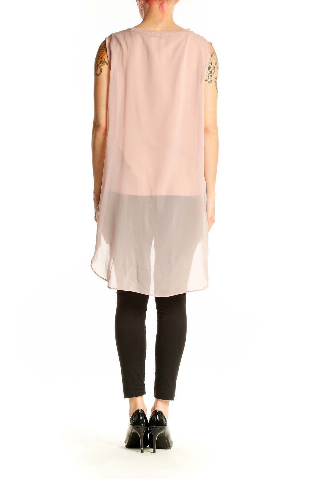 Back view of blush sleeveless chiffon overlay top by Calvin Klein Jeans showing high-low hemline