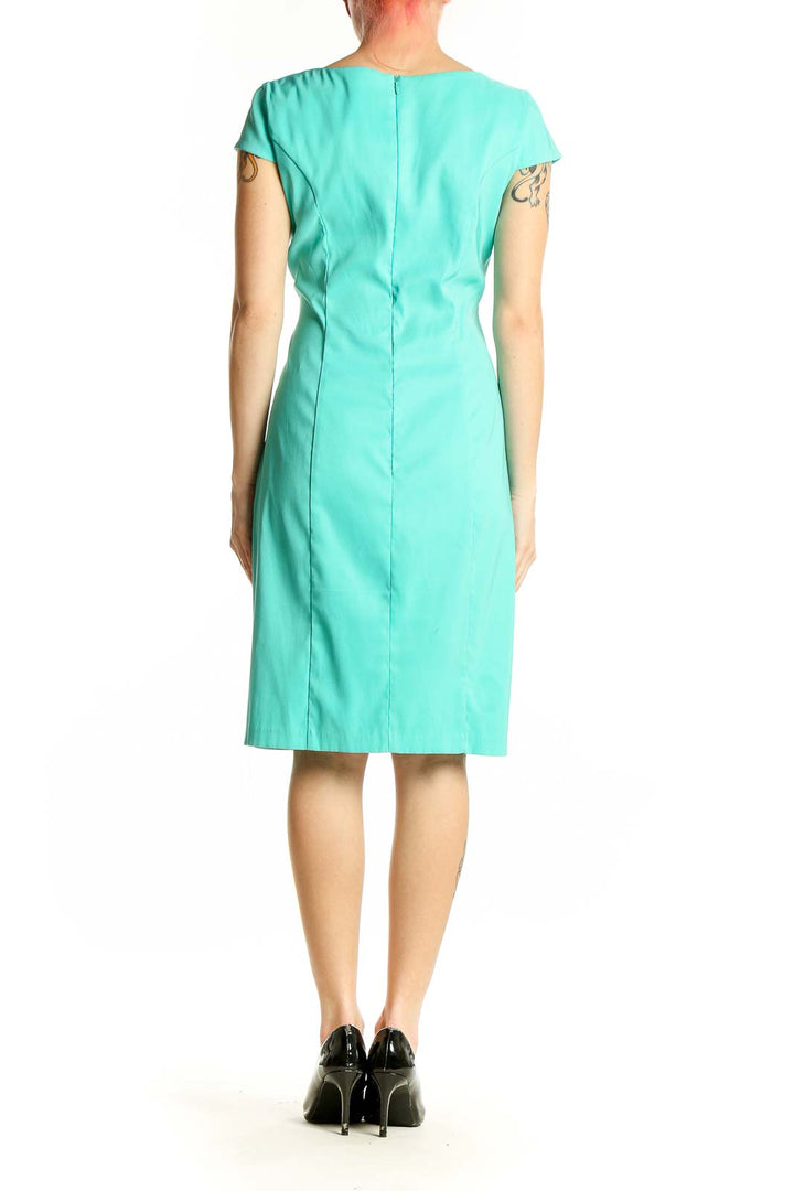 Side view of turquoise ALYX structured bodycon midi dress