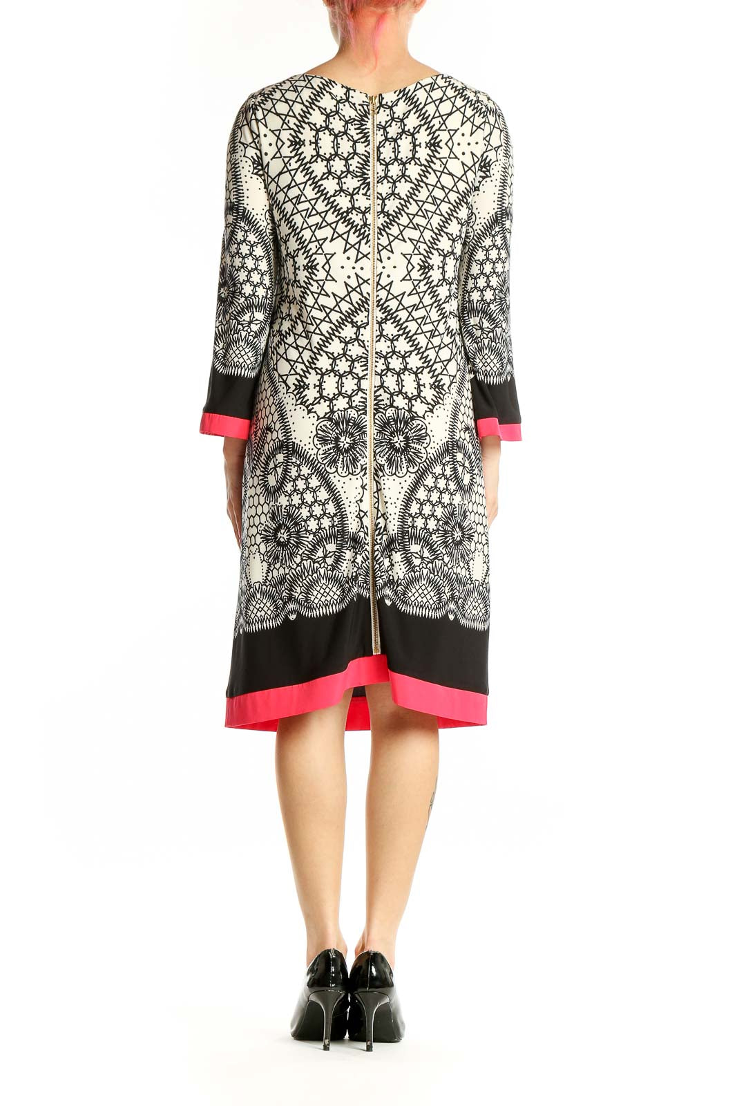 Side view of Eliza J black and white geometric print dress showing sleeve detail