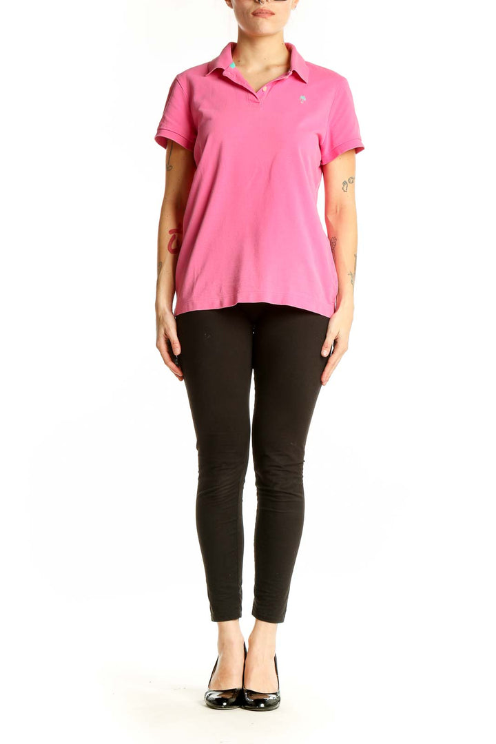 Front view of pink Lilly Pulitzer cotton polo shirt