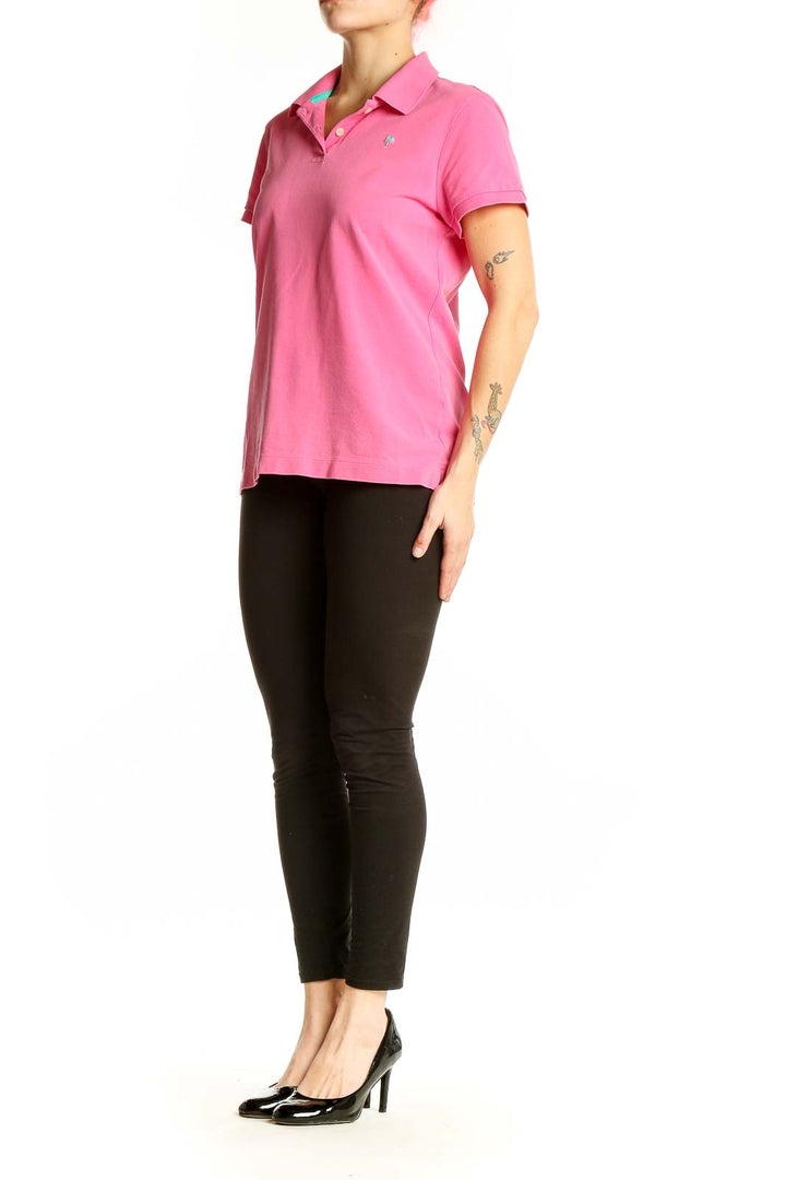 Front view of pink Lilly Pulitzer cotton polo shirt