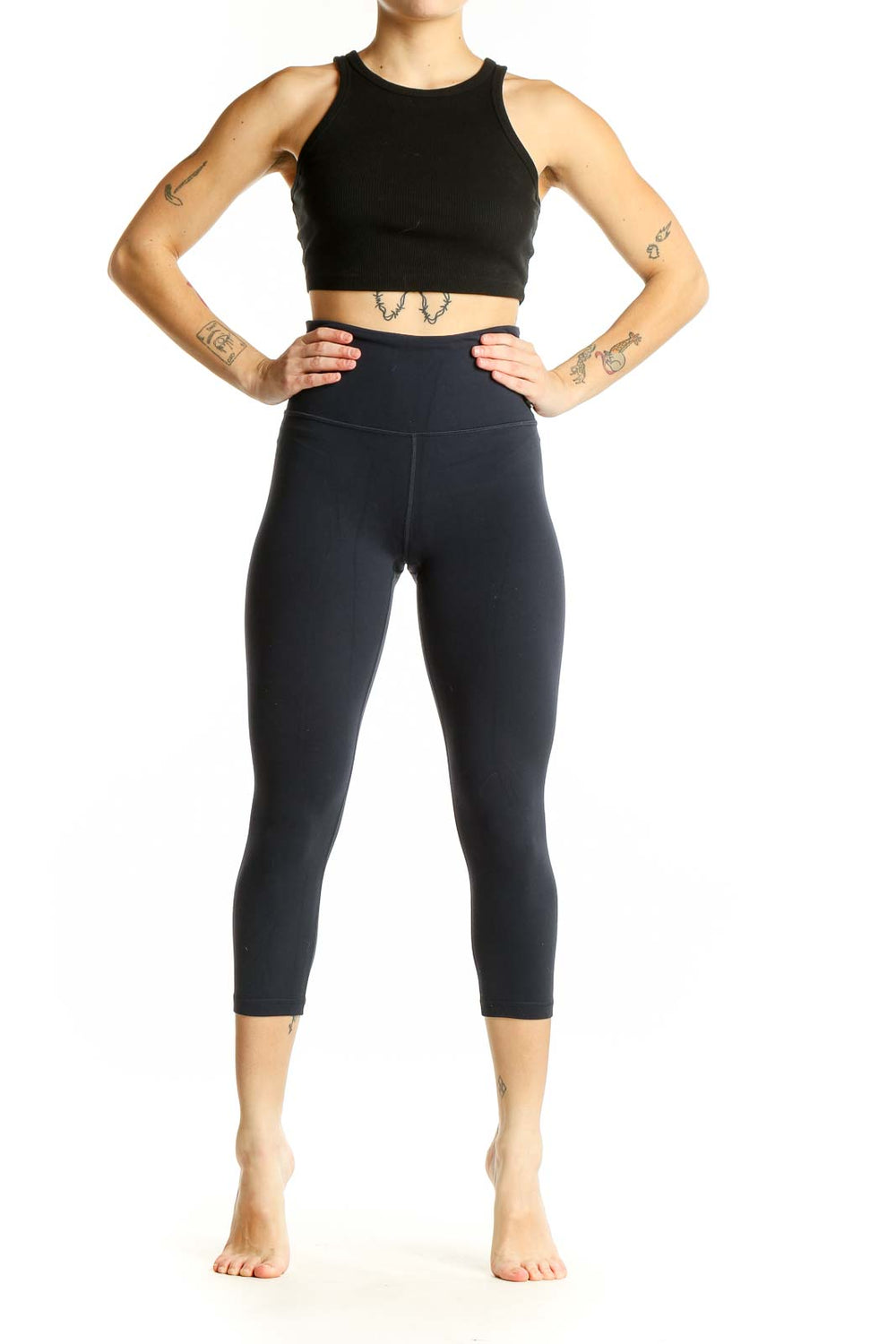 Front view of black Athleta high-waisted capri leggings