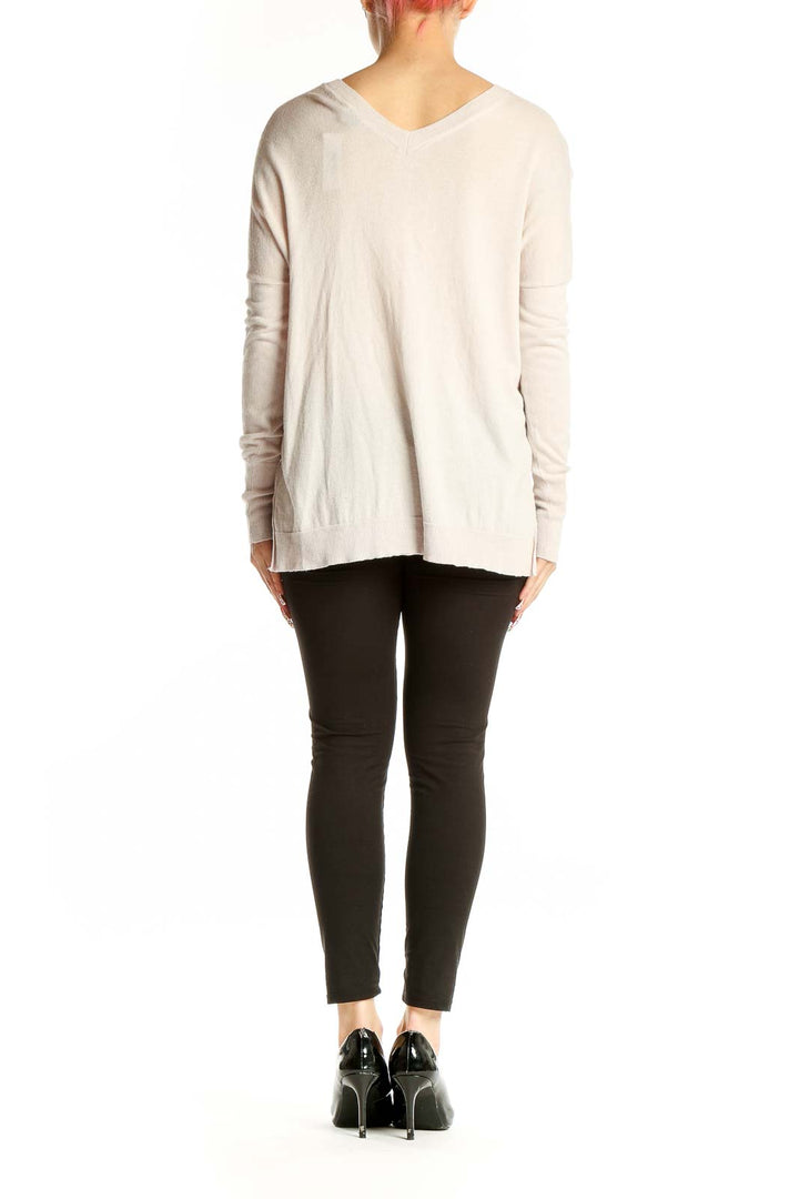 Side view of Vince cream cashmere-silk V-neck sweater on model