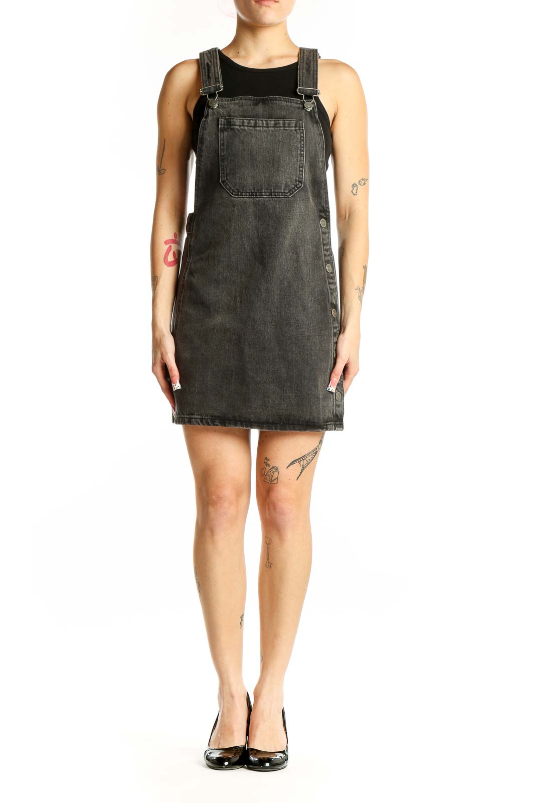 Front view of Free People charcoal denim overall mini dress with bib pocket