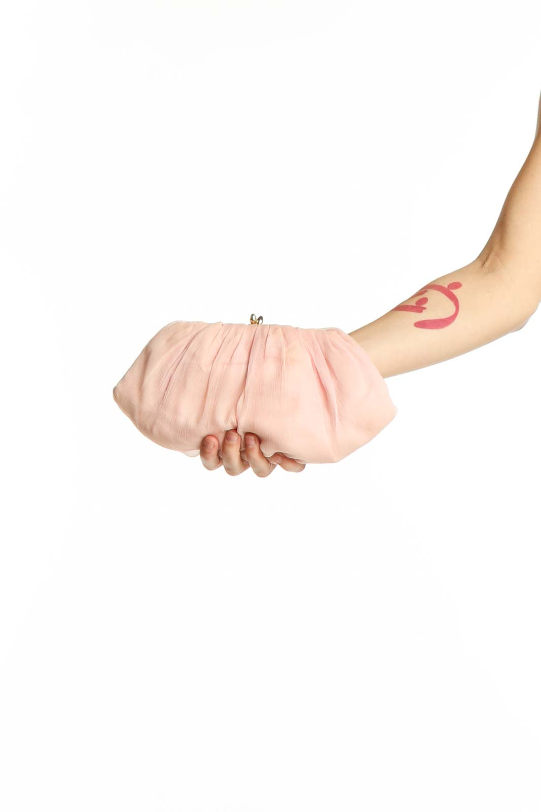 Front view of SilkRoll pink pleated clutch purse held in hand