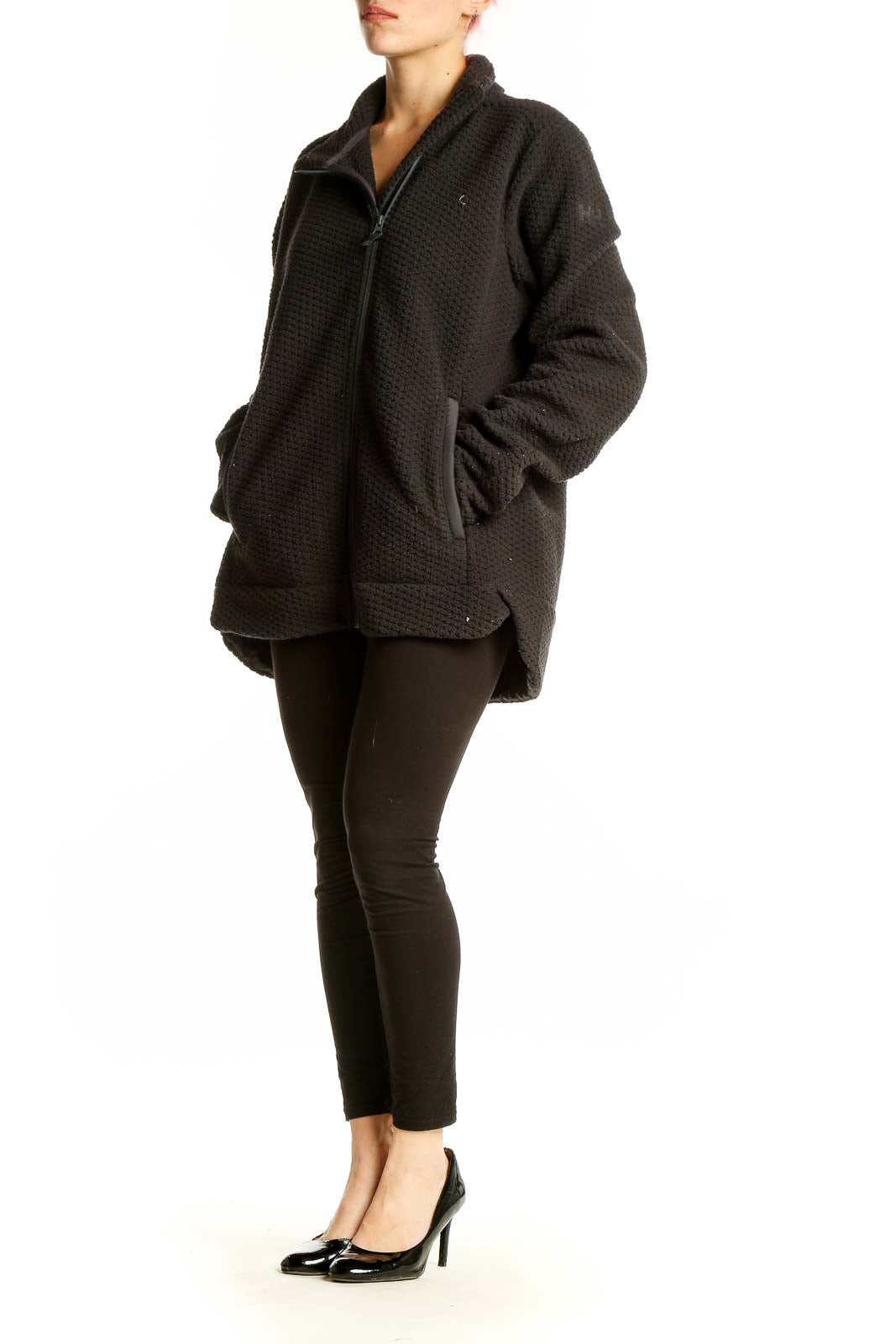 Front view of black textured Helly Hansen zip-up hooded jacket