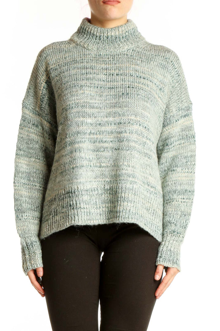 Front view of J.Crew mint green marled turtleneck sweater on model