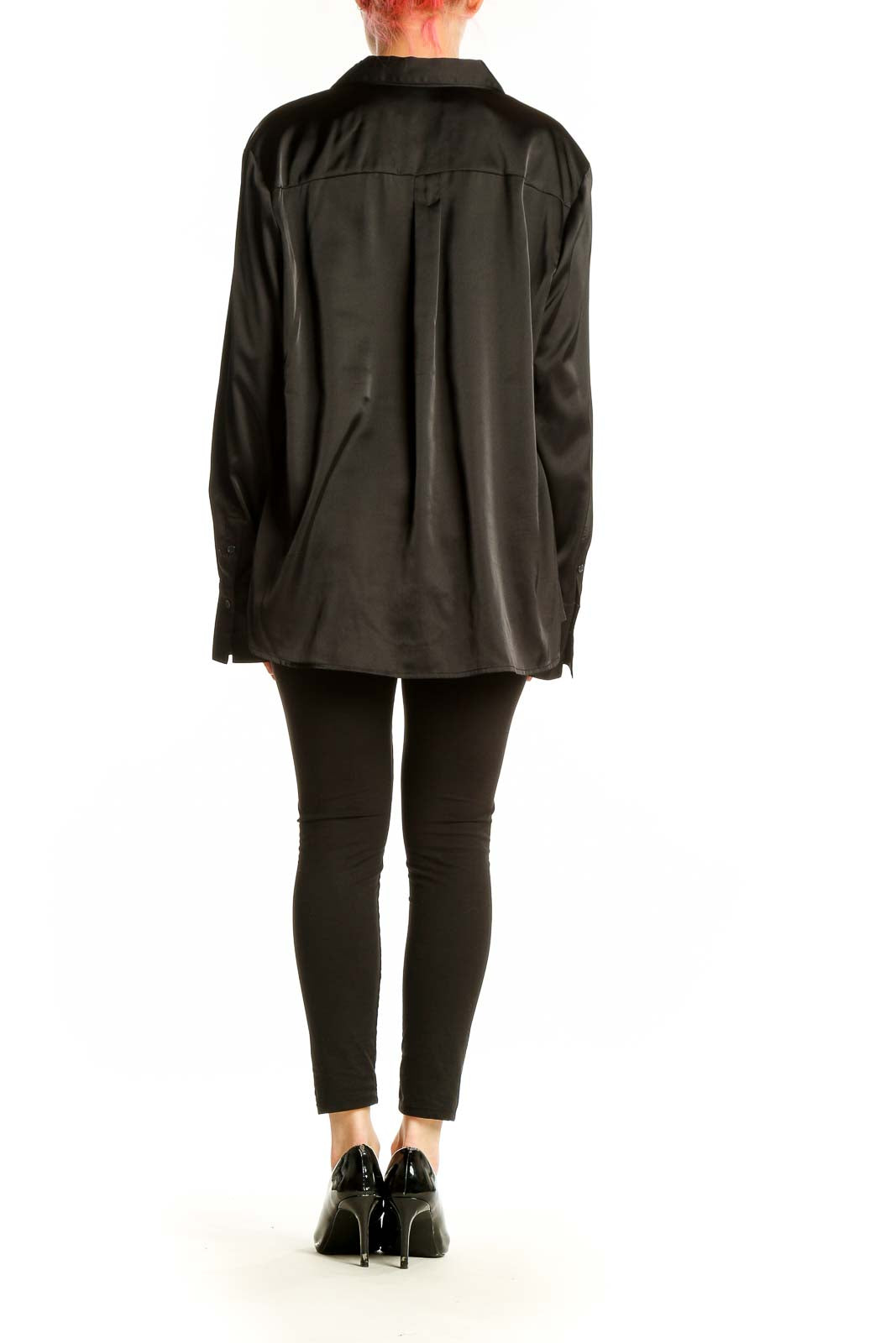 Side view of model wearing Banana Republic black satin button-down blouse