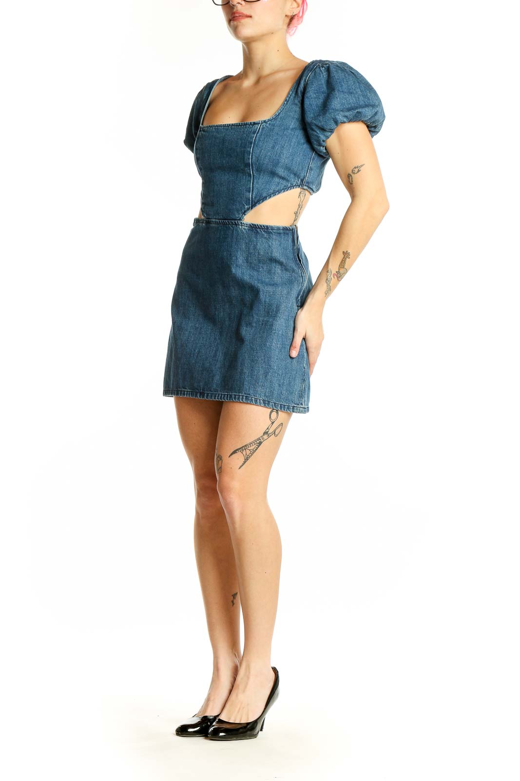 Front view of blue denim mini dress with square neckline and puff sleeves