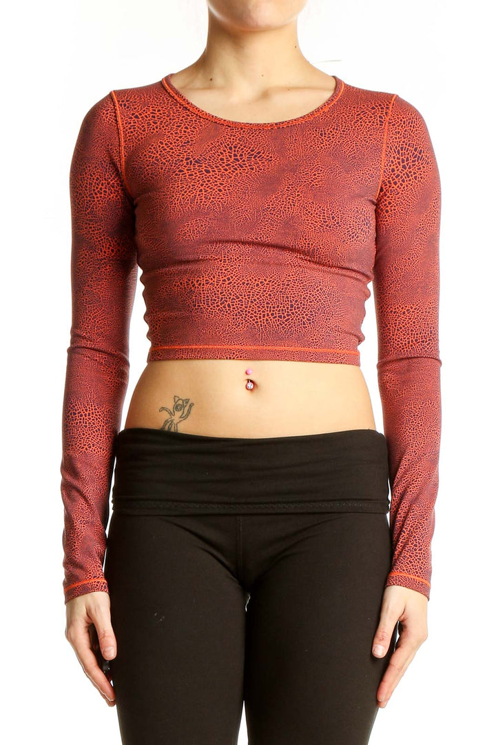 Front view of red patterned Lululemon crop top