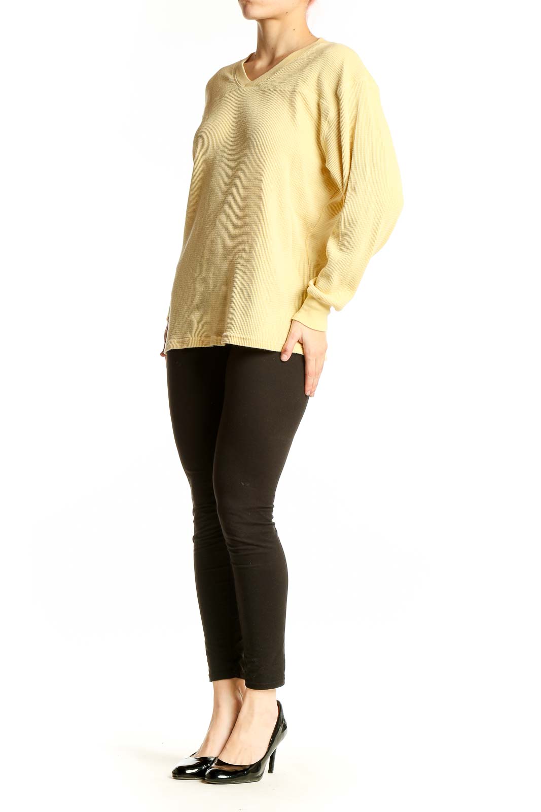 Front view of yellow V-neck ribbed long sleeve top from Tna