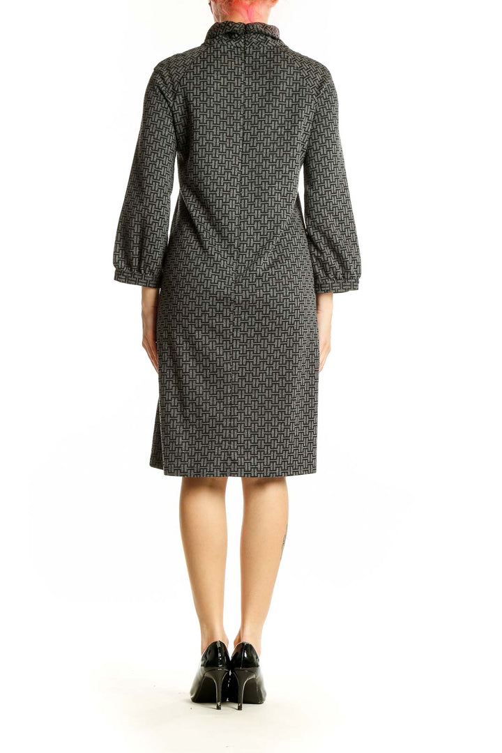 Back view of Ellen Tracy gray geometric print turtleneck dress showing knee-length cut