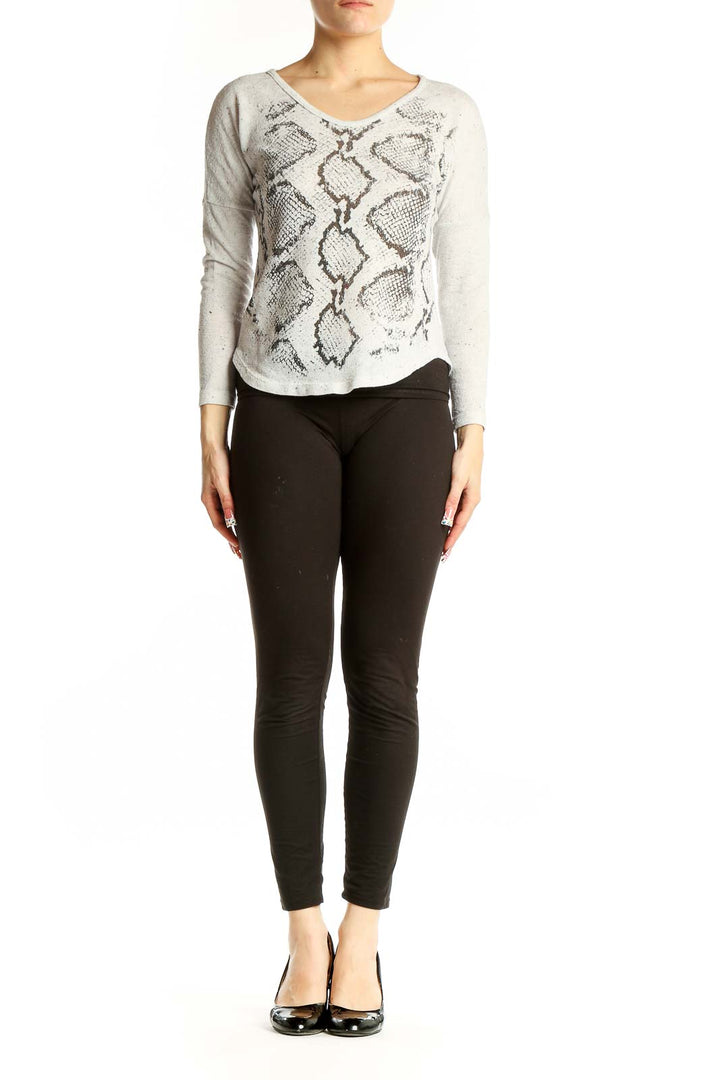 Front view of Renee C. gray snake print long sleeve top