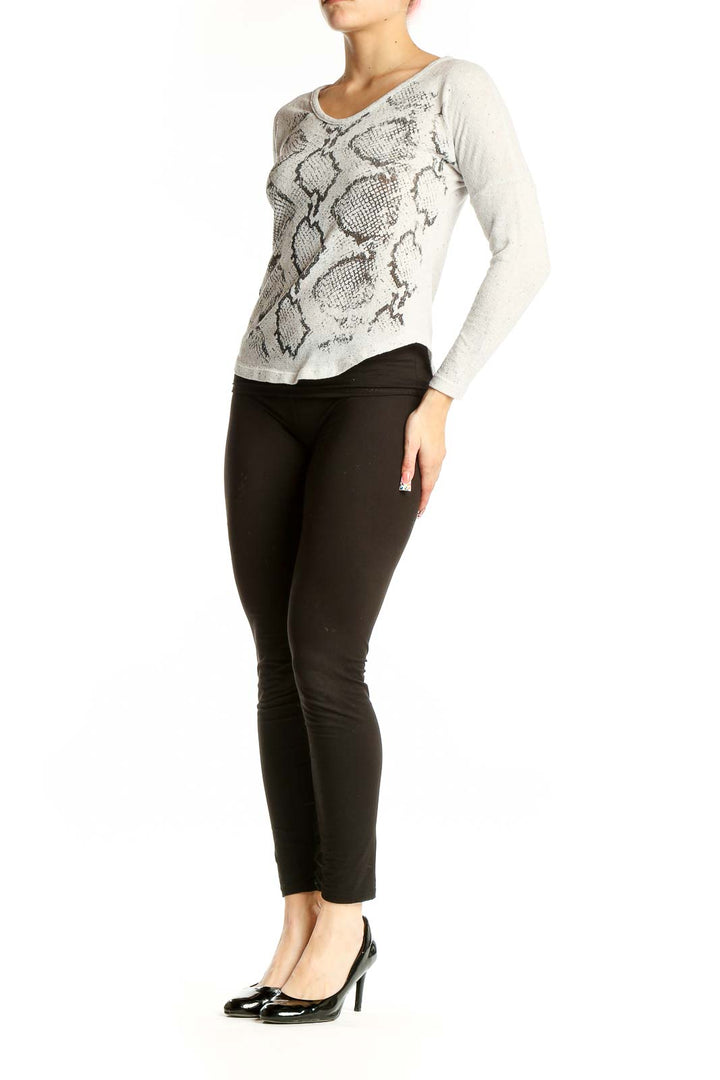 Front view of Renee C. gray snake print long sleeve top