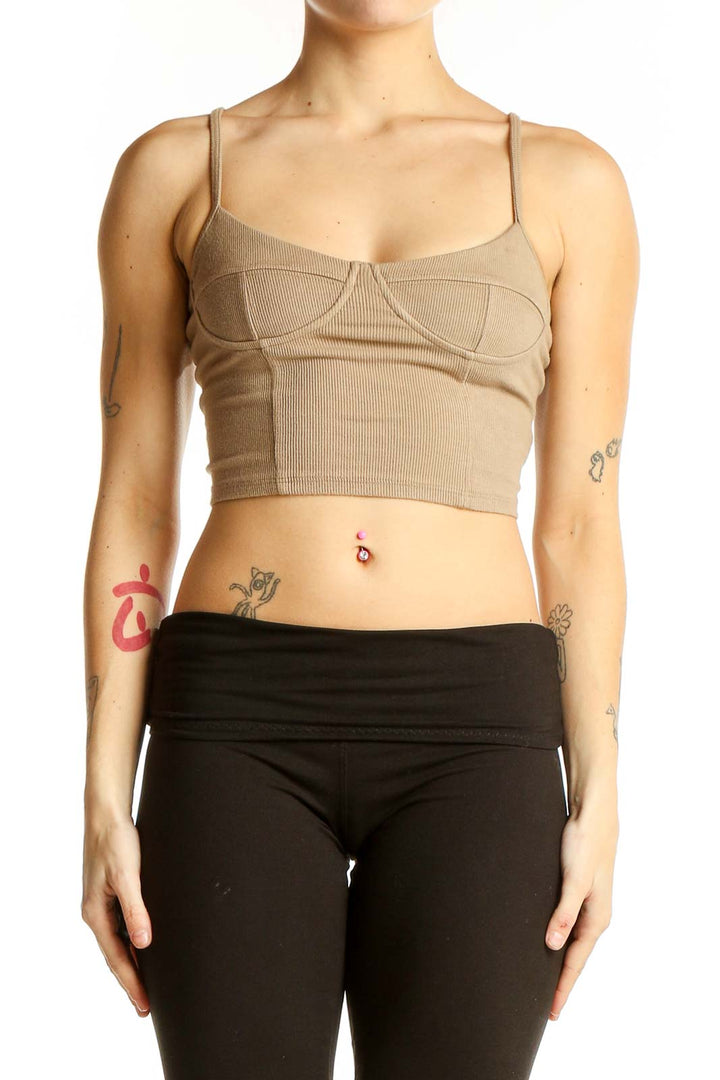Front view of JOAH BROWN beige ribbed crop top with bustier design