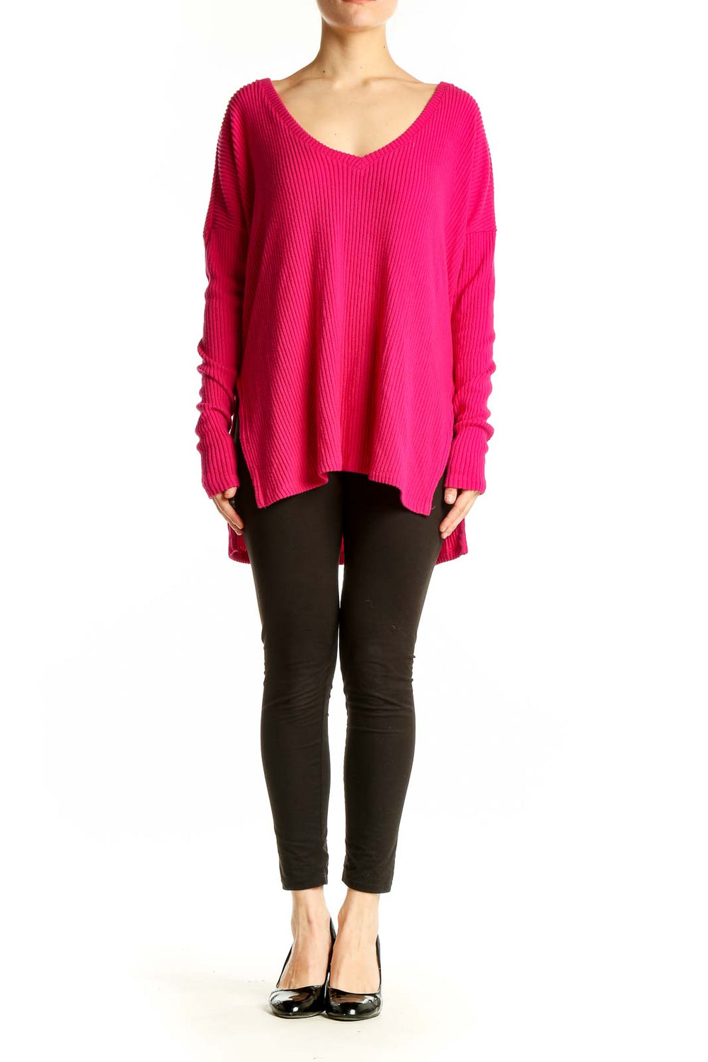 Front view of hot pink oversized V-neck ribbed sweater by Babaton
