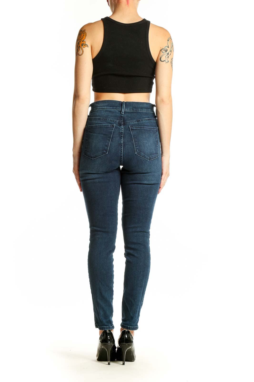 Side view of MOTT & BOW dark blue high-rise skinny jeans on model