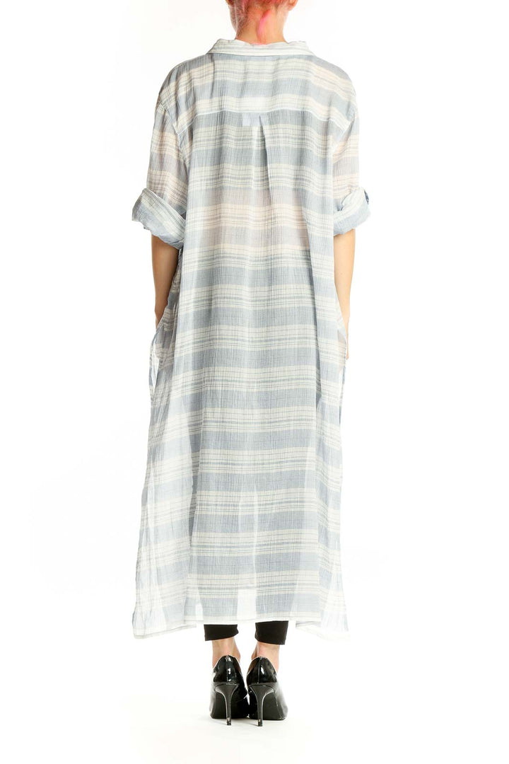 Side view of Calvin Klein light blue plaid cotton maxi shirt dress showing oversized fit