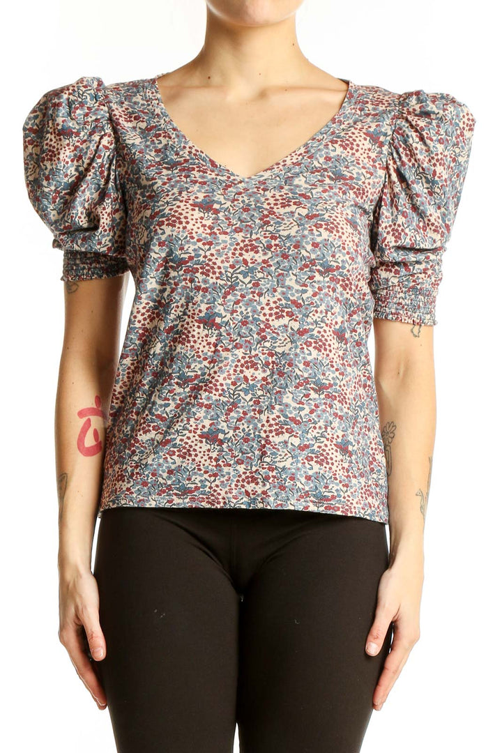 Front view of Nation LTD multicolor floral puff sleeve cotton top