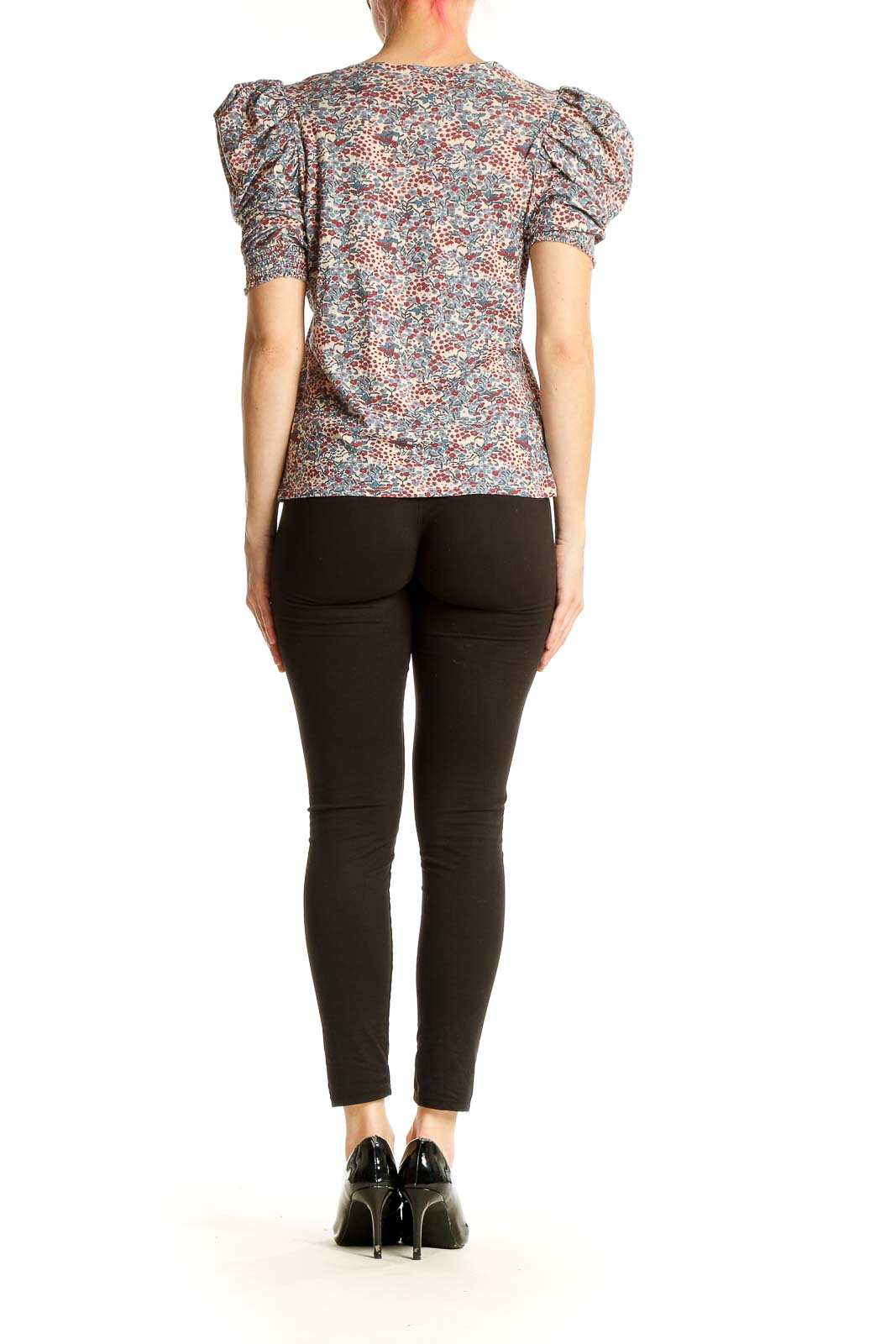 Side view of Nation LTD multicolor floral puff sleeve cotton top on model
