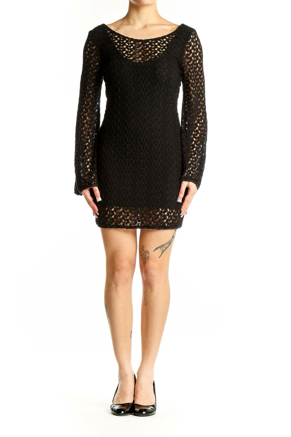 Front view of Free People black crochet knit mini dress with long bell sleeves