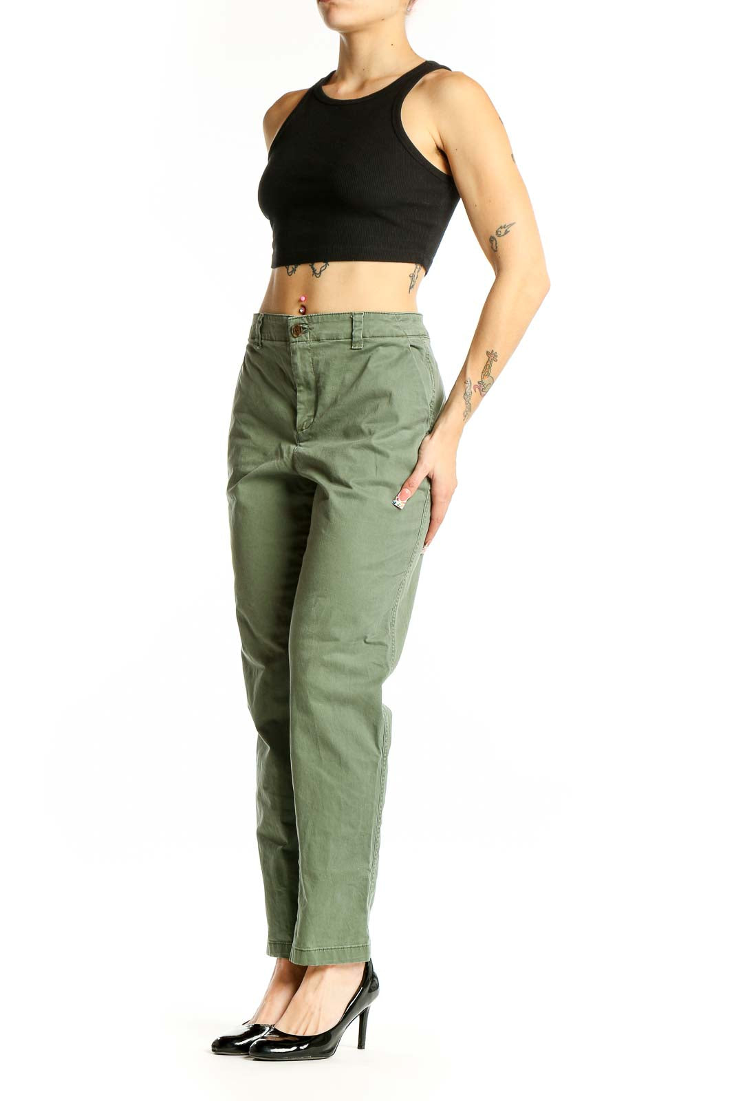 Front view of olive green Gap chino pants on model