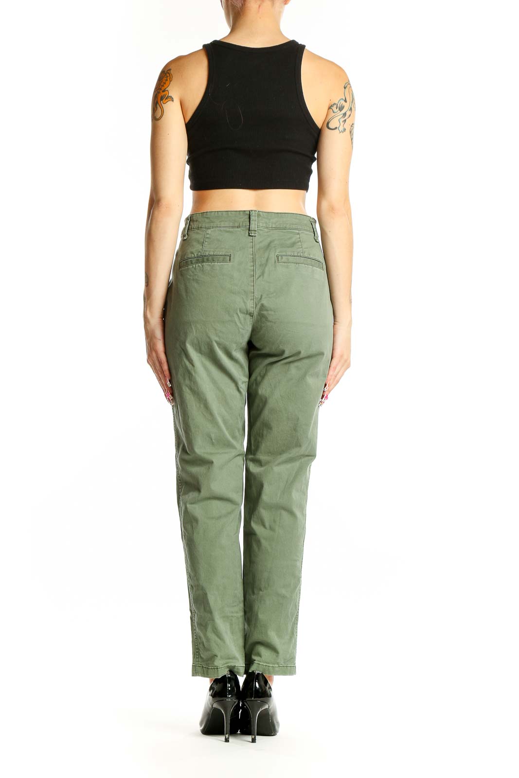 Back view of olive green Gap chino pants on model with black crop top