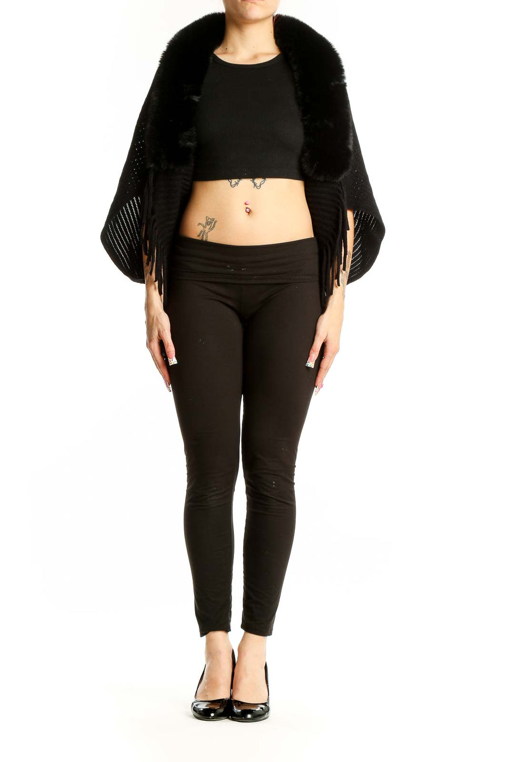 Front view of black knit shawl with fur collar and fringe detail