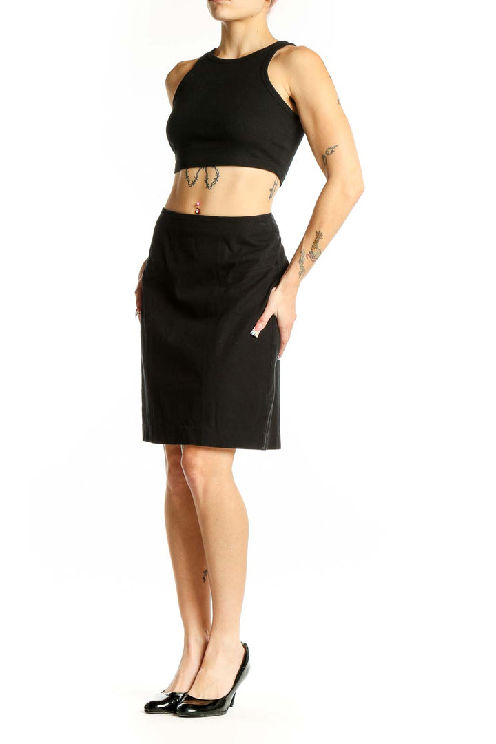 Front view of black Gap pencil skirt on model
