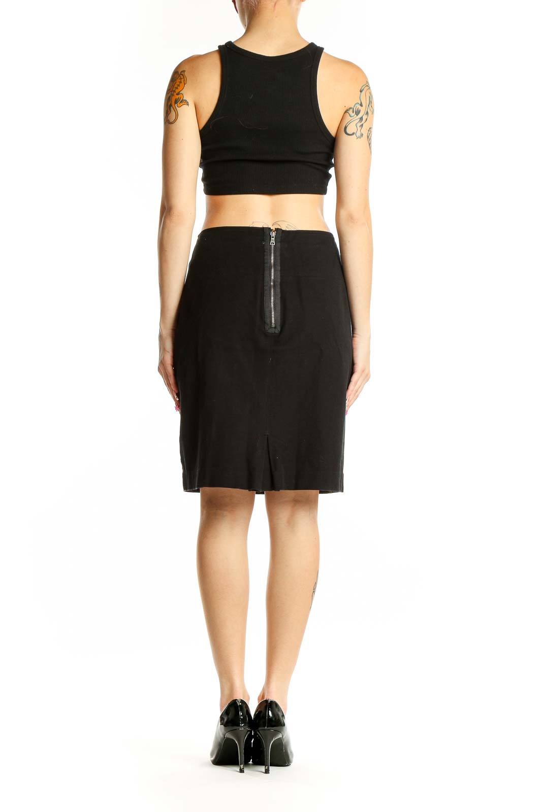 Side view of black Gap pencil skirt with matching crop top