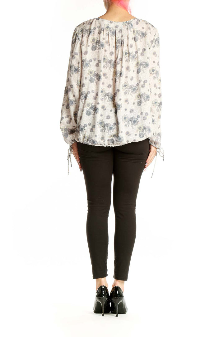 Back view of Lucky Brand cream floral print peasant blouse showing relaxed fit