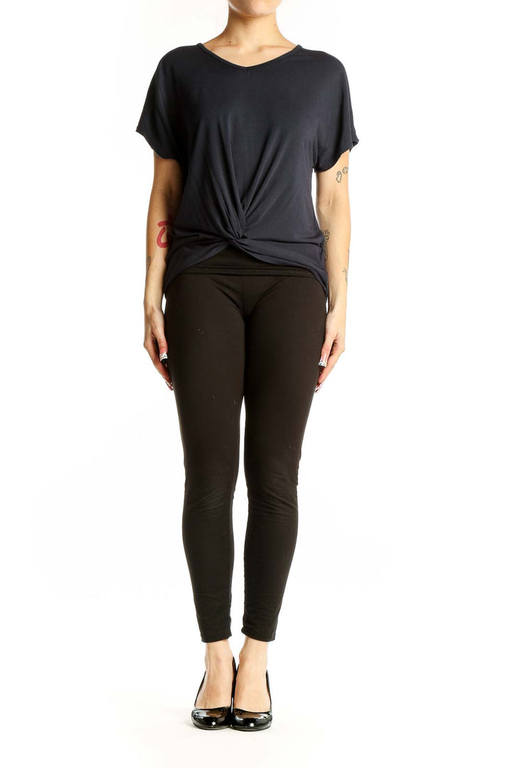 Front view of Elie Tahari black twist-front top with V-neckline