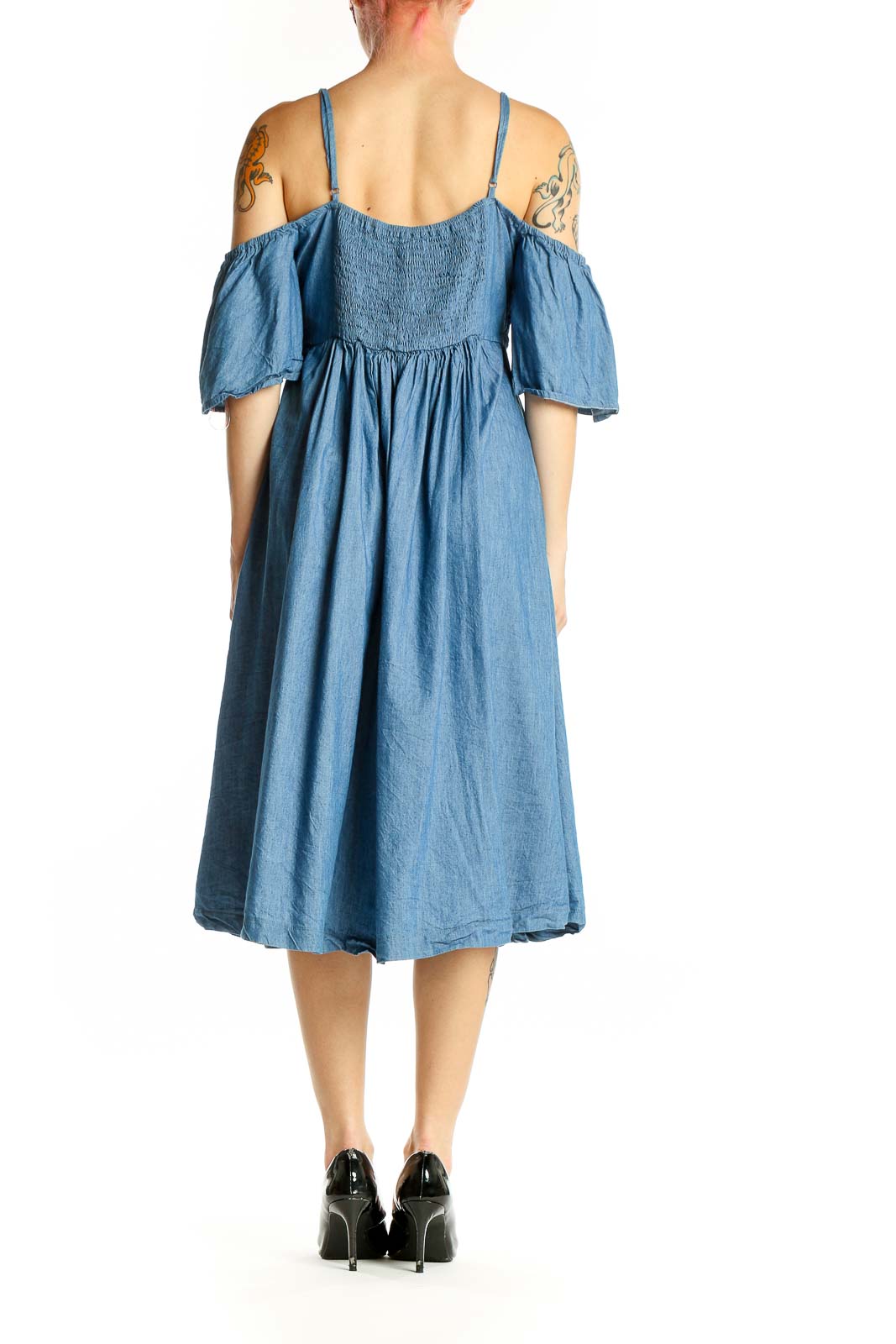 Side view of blue cotton off-shoulder midi dress showing fluttery sleeves