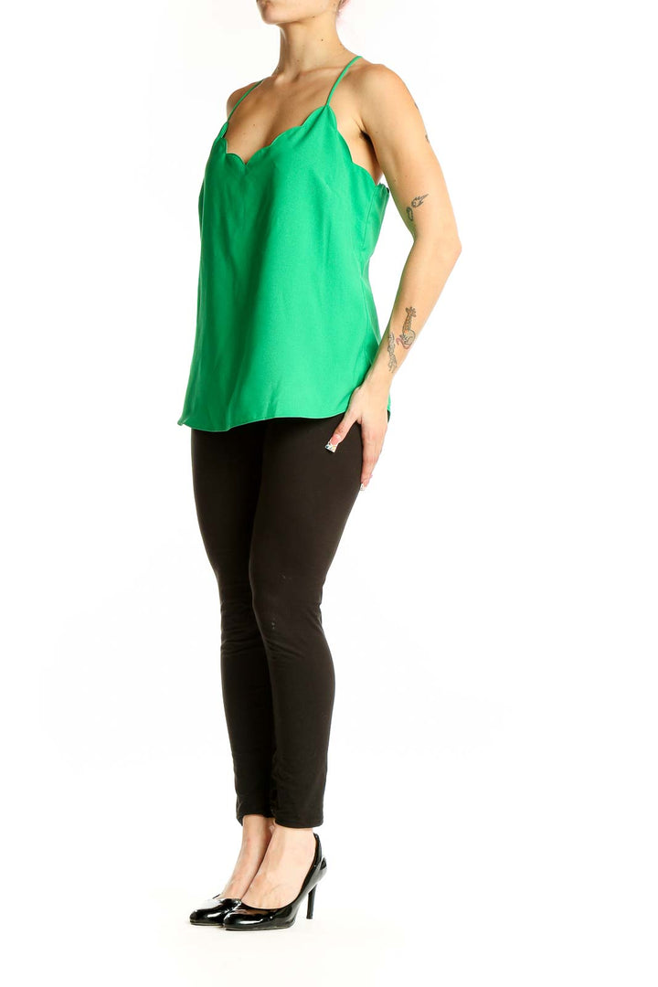 Front view of green J.Crew camisole top with scalloped V-neck