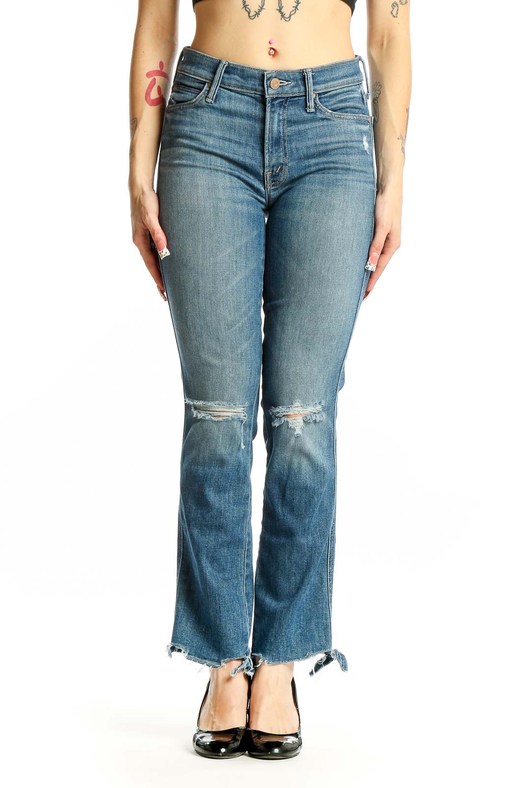 Front view of Mother blue flare jeans with distressed knees