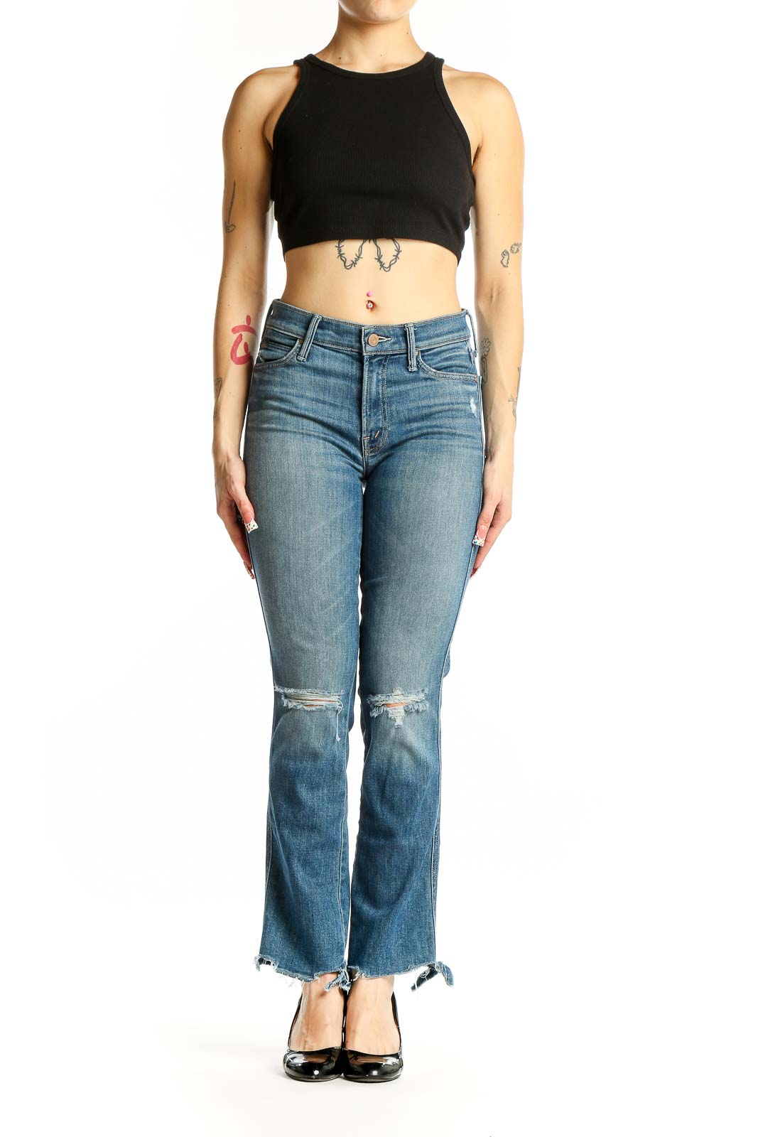Front view of Mother blue flare jeans with distressed knees