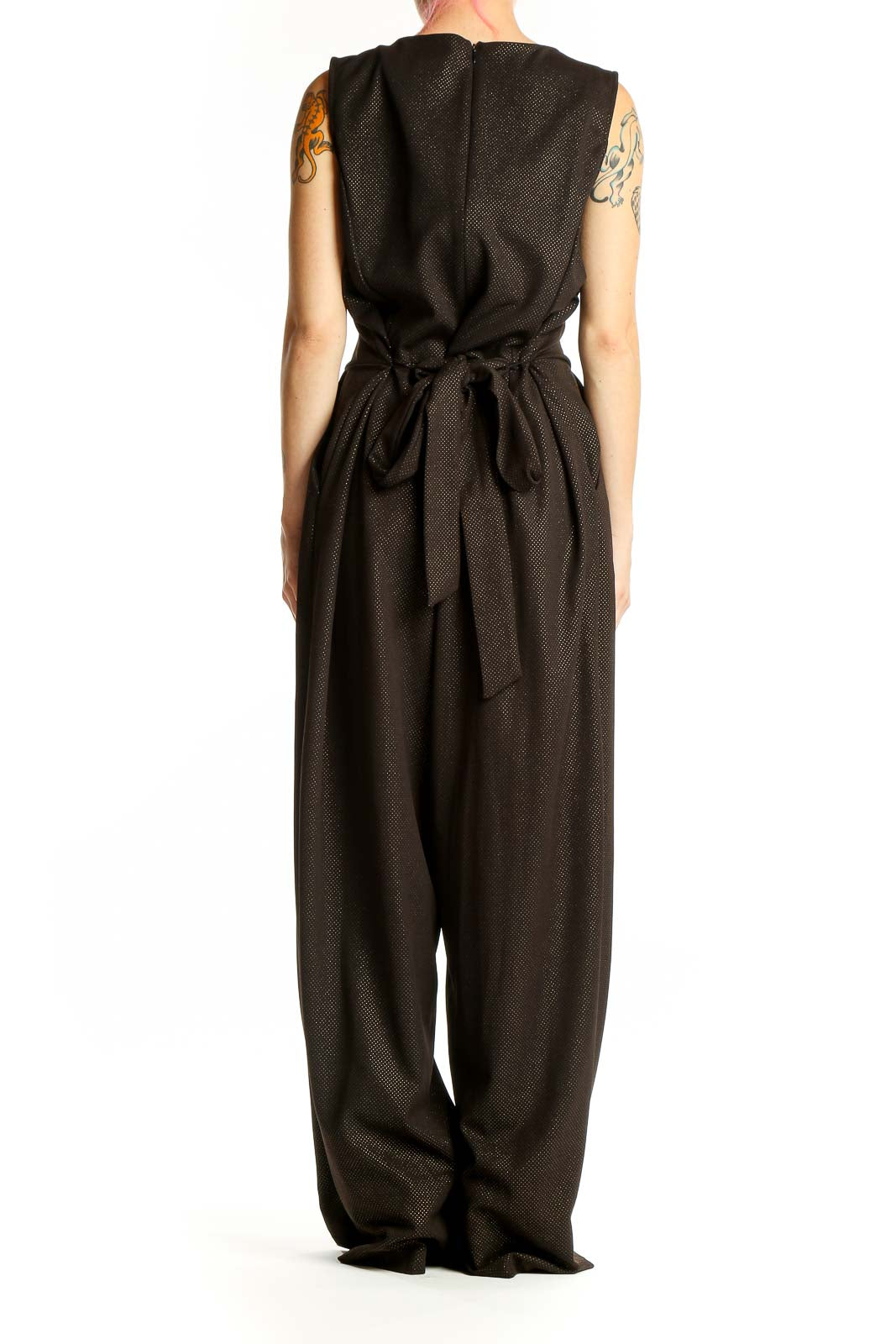 Side view of Emma & Michele black wide-leg jumpsuit showing silhouette
