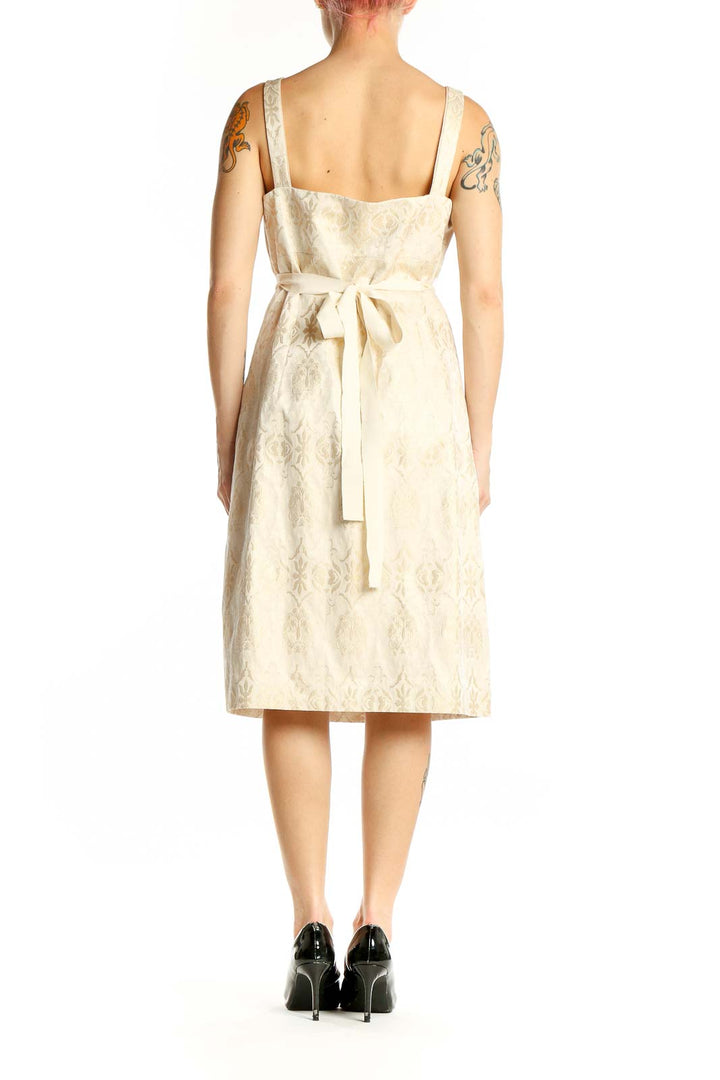 Side view of Tahari cream floral jacquard belted midi dress