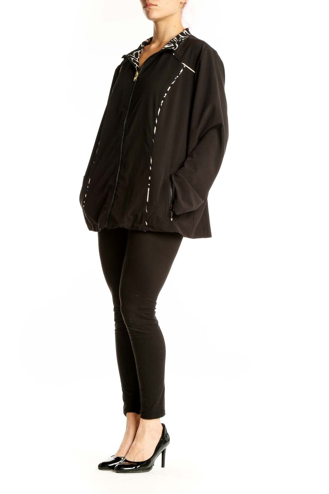 Front view of black SilkRoll athletic jacket with white accents and zip-up design