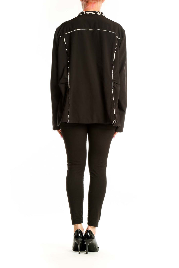 Back view of SilkRoll black athletic jacket showing full length and relaxed fit